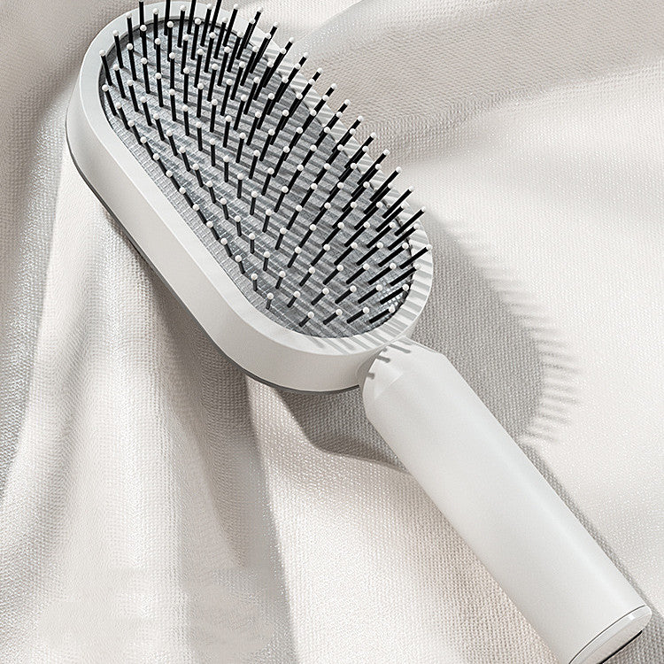 Nexova™ - Self Cleaning Hair Brush